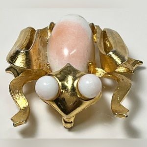 As is goldtone & white/pink glass figural frog brooch (463)